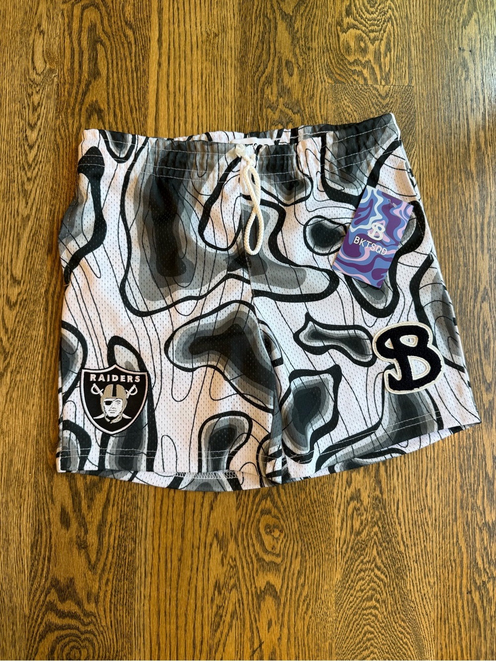Kids' Black & White Mesh Athletic Shorts with Raiders Patch
